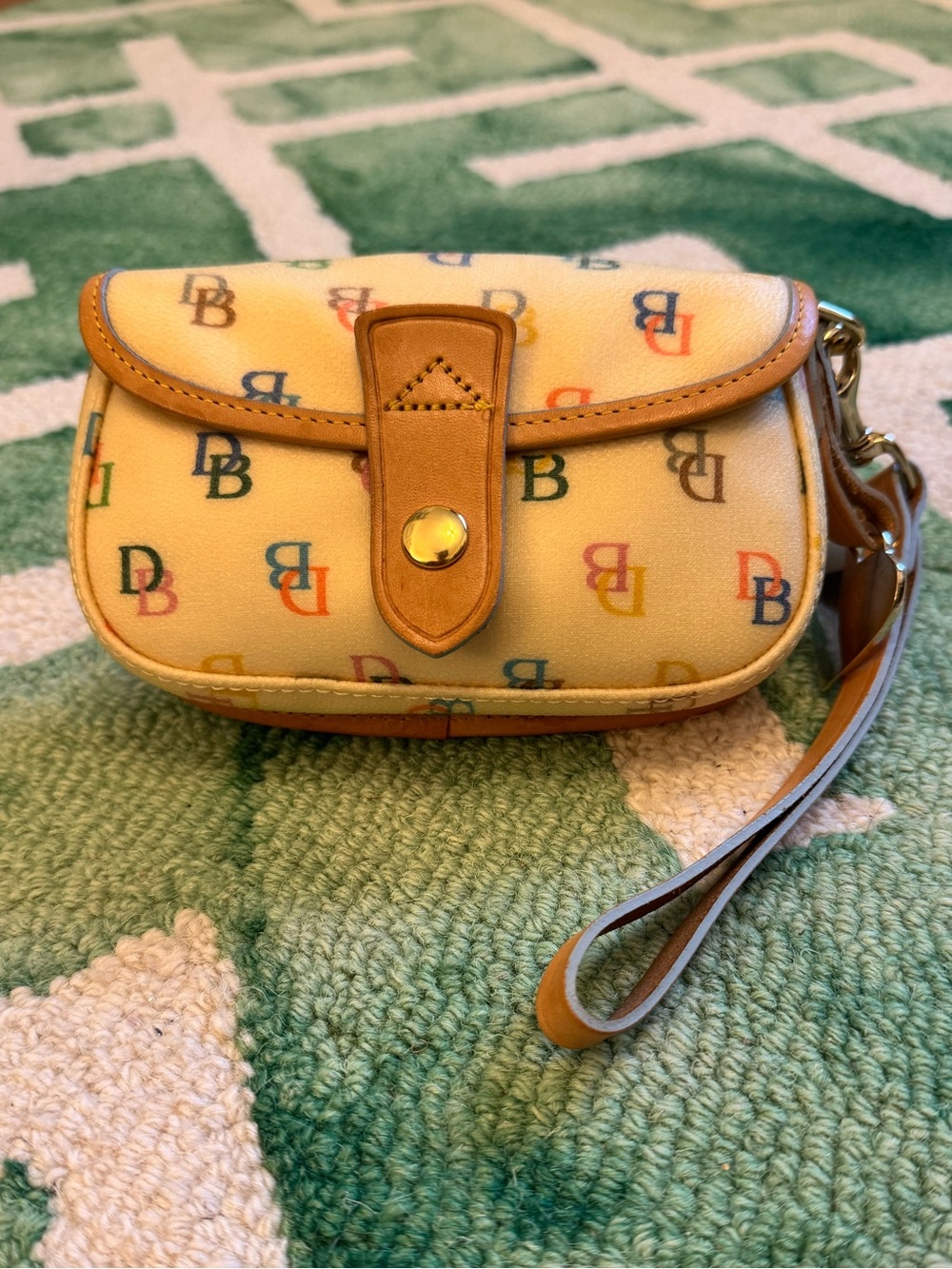 Vintage Dooney & Bourke Rainbow Signature Monogram Flap Wristlet. Very clean.